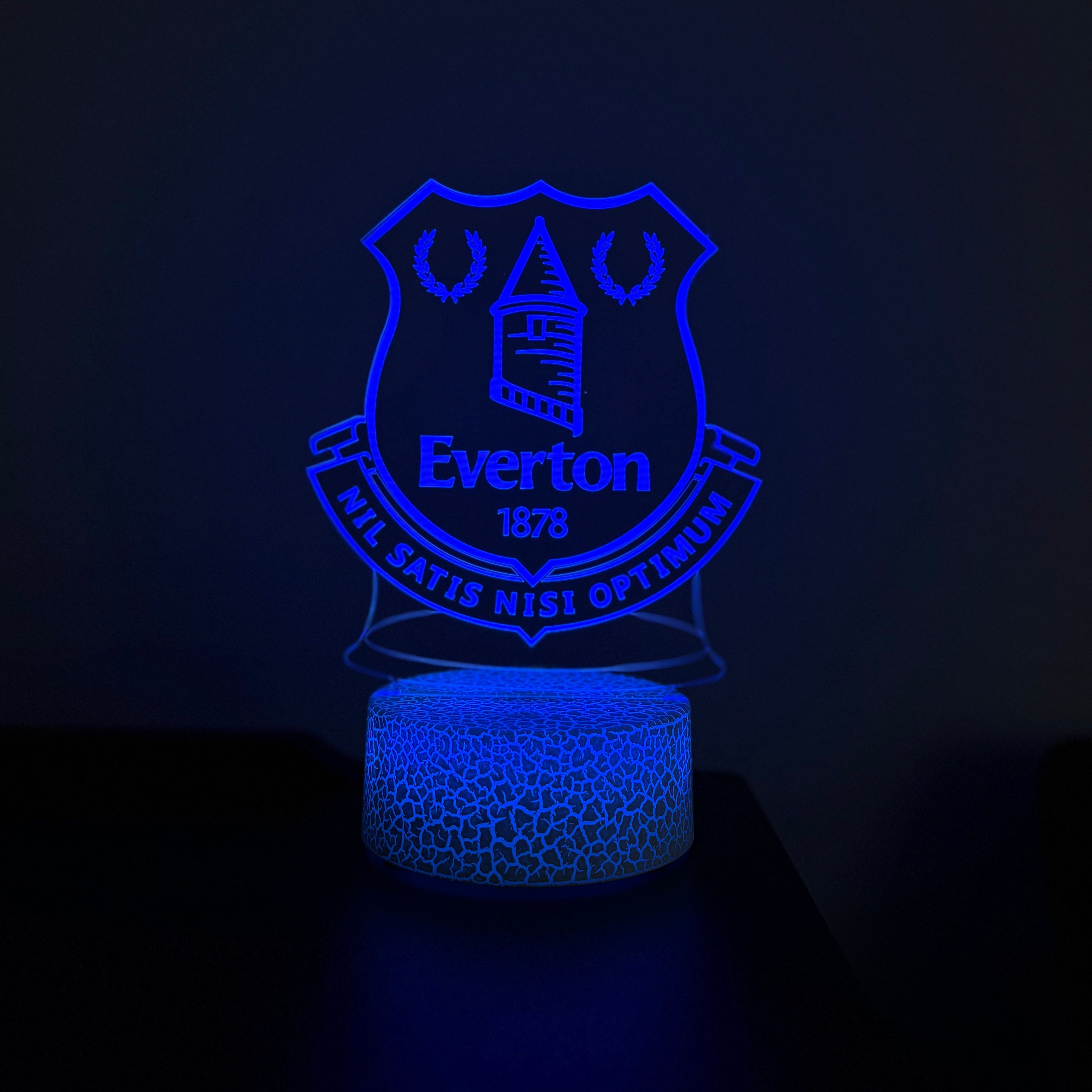 Blue LED lamp with Everton logo on a dark background
