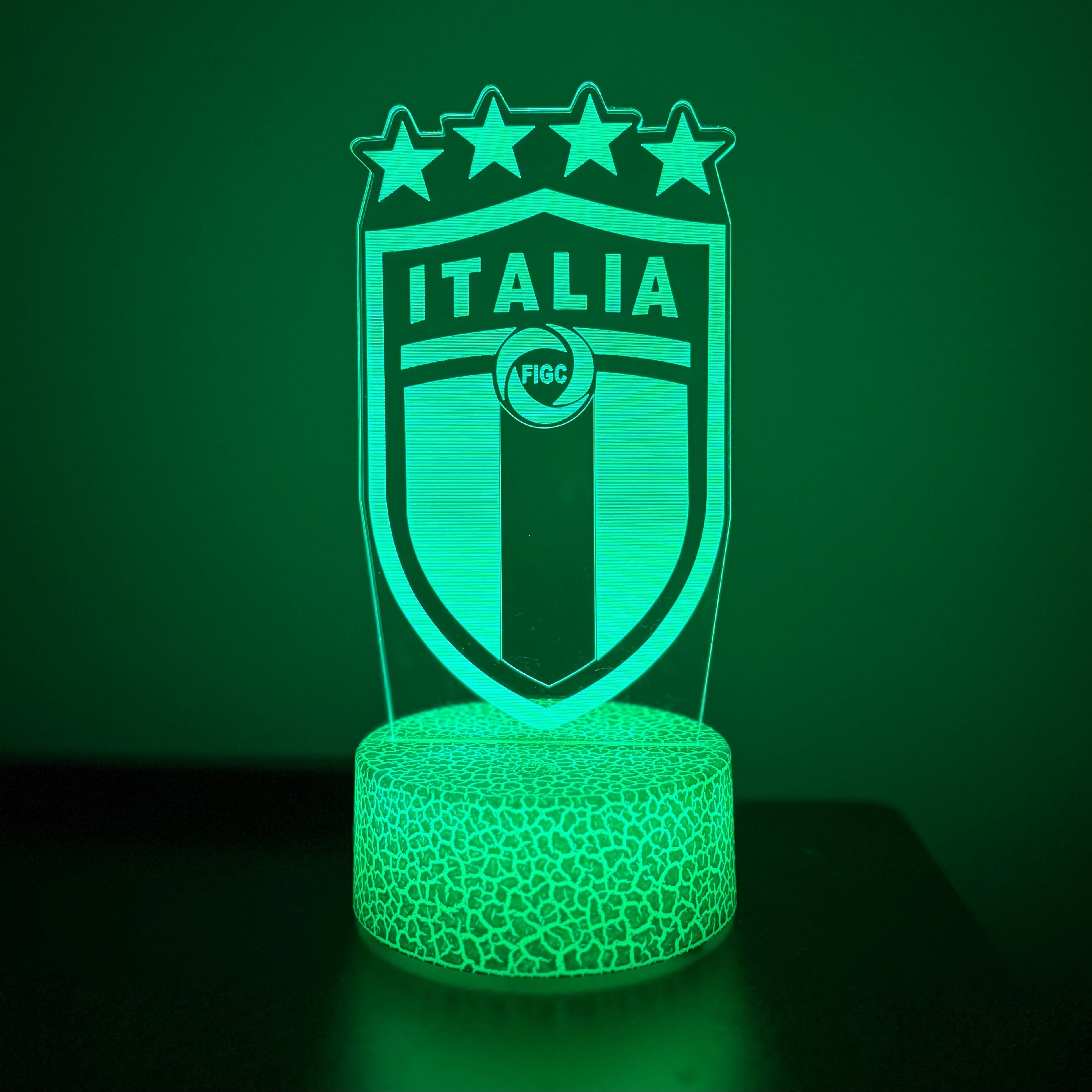 Green LED lamp with 'Italia' and star design on a dark background
